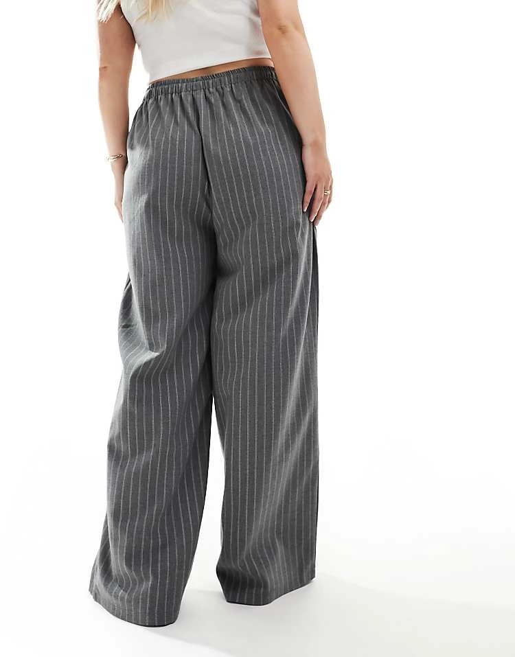 In The Style Plus X Perrie Sian Exclusive Wide Leg Drawstring Trouser In Grey Pinstripe For Women 4 In The Style Plus X Perrie Sian Exclusive Wide Leg Drawstring Trouser In Grey Pinstripe For Women - Image 4