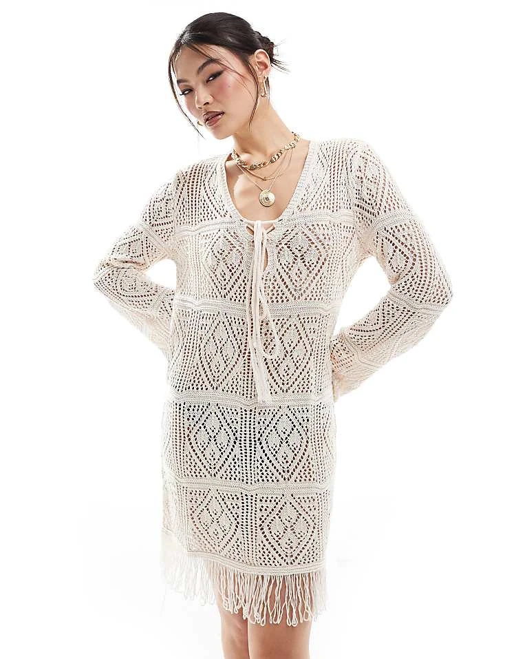 In The Style V Neck Tie Detail Tassel Hem Crochet Mini Beach Dress In Beige For Women 5 In The Style V Neck Tie Detail Tassel Hem Crochet Mini Beach Dress In Beige For Women - Image 5