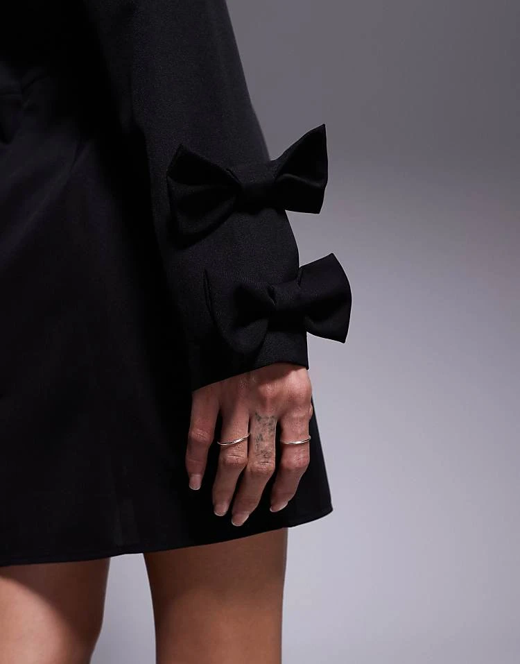 In The Style X Perrie Sian Exclusive Structured Long Sleeve Bow Detail Mini Dress In Black For Women 4 In The Style X Perrie Sian Exclusive Structured Long Sleeve Bow Detail Mini Dress In Black For Women - Image 4
