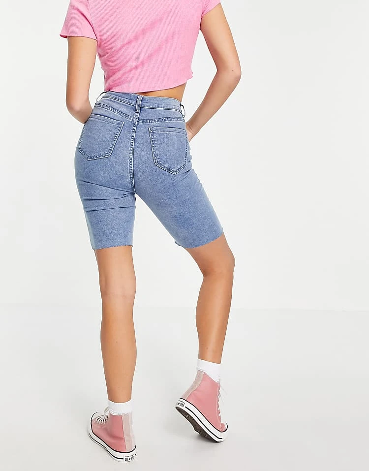 In The Style X Olivia Bowen Exclusive Cut Off Denim Longline Shorts In Blue For Women 2 In The Style X Olivia Bowen Exclusive Cut Off Denim Longline Shorts In Blue For Women - Image 2
